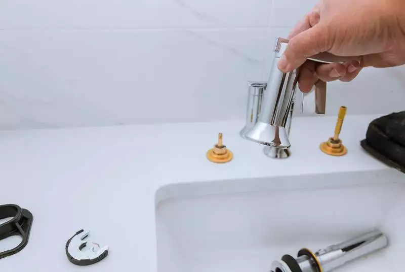 fixing a bathroom sink faucet